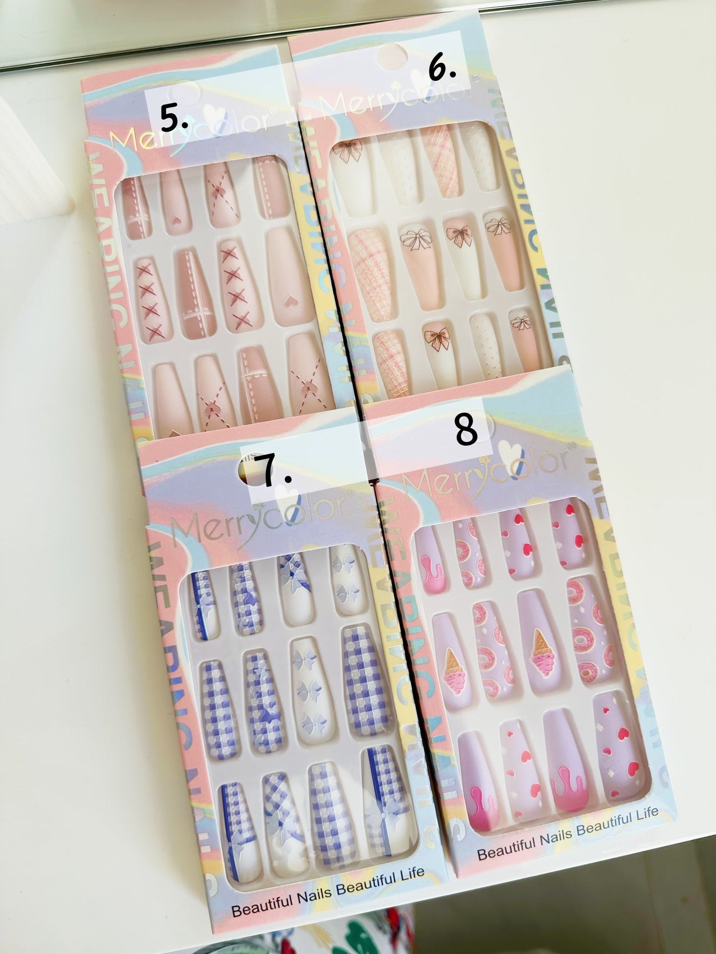 caja de uñas press on ref del 5 al 8 c/u[S-E26-D]