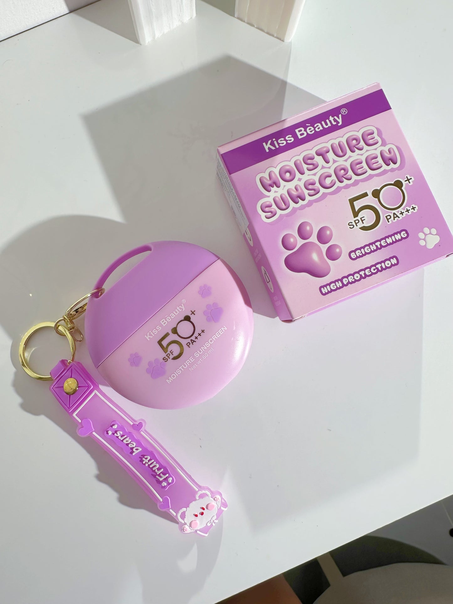 Protector solar sin color llavero